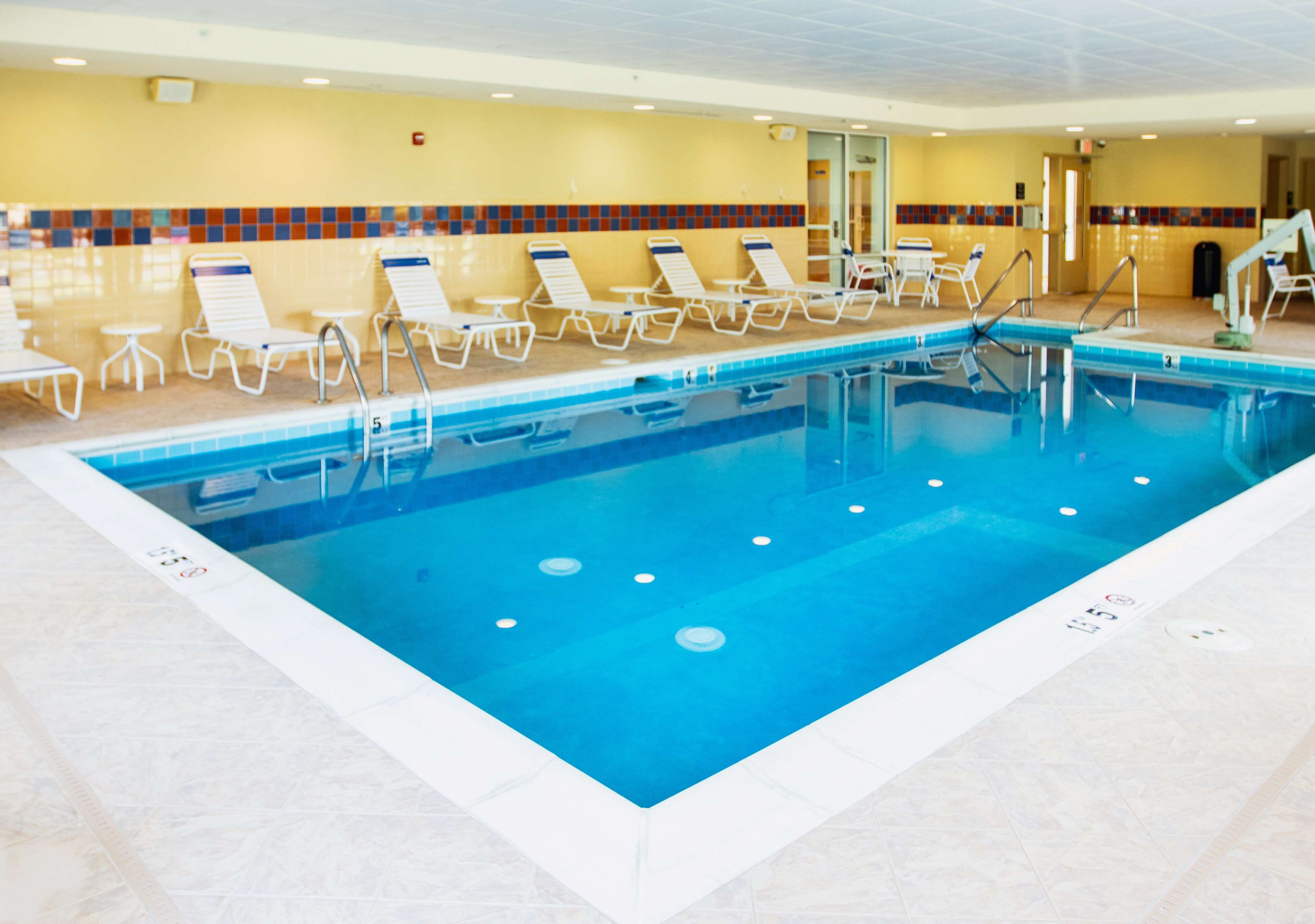 indoor pool, open 10 am to 10 pm, pool loungers