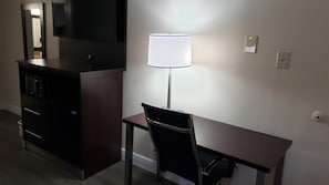 Desk, laptop workspace, iron/ironing board, free cribs/infant beds