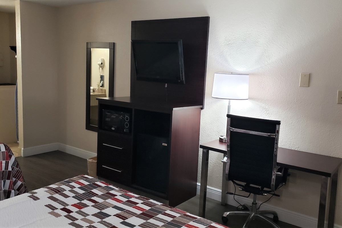 Desk, laptop workspace, iron/ironing board, cribs (free)