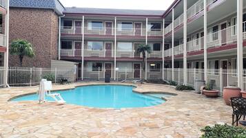 Outdoor pool, open 9 AM to 9 PM, pool umbrellas, sun loungers