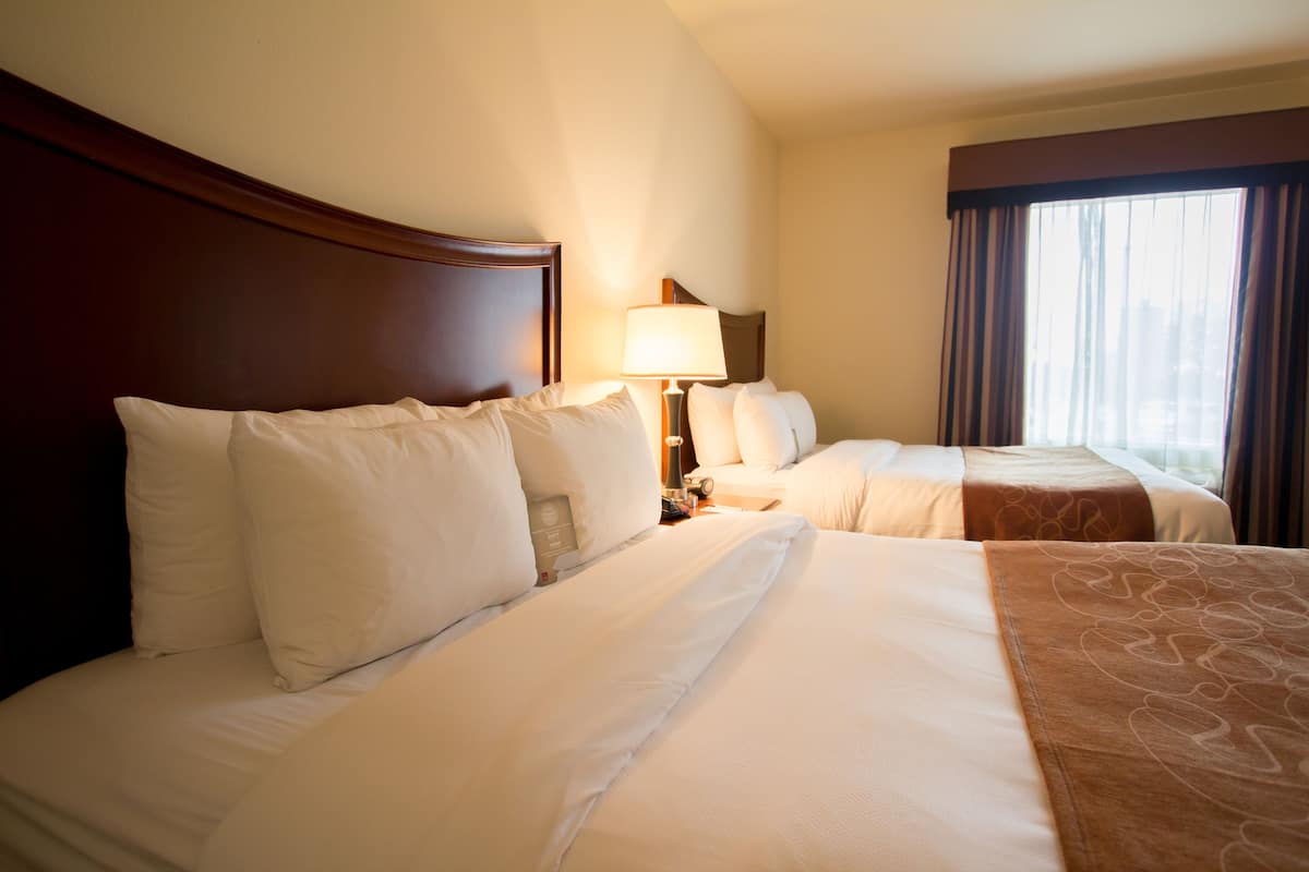 suite, 2 queen beds and sofa-bed, non-smoking | premium bedding, pillow-top beds, desk, laptop workspace