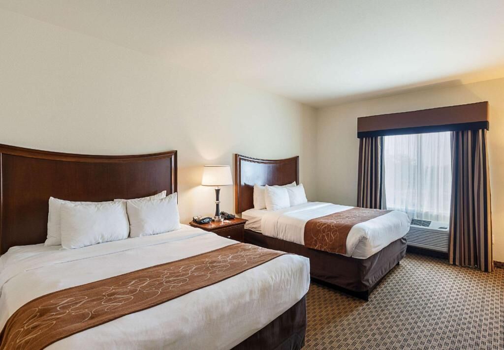 Premium bedding, pillow-top beds, desk, laptop workspace