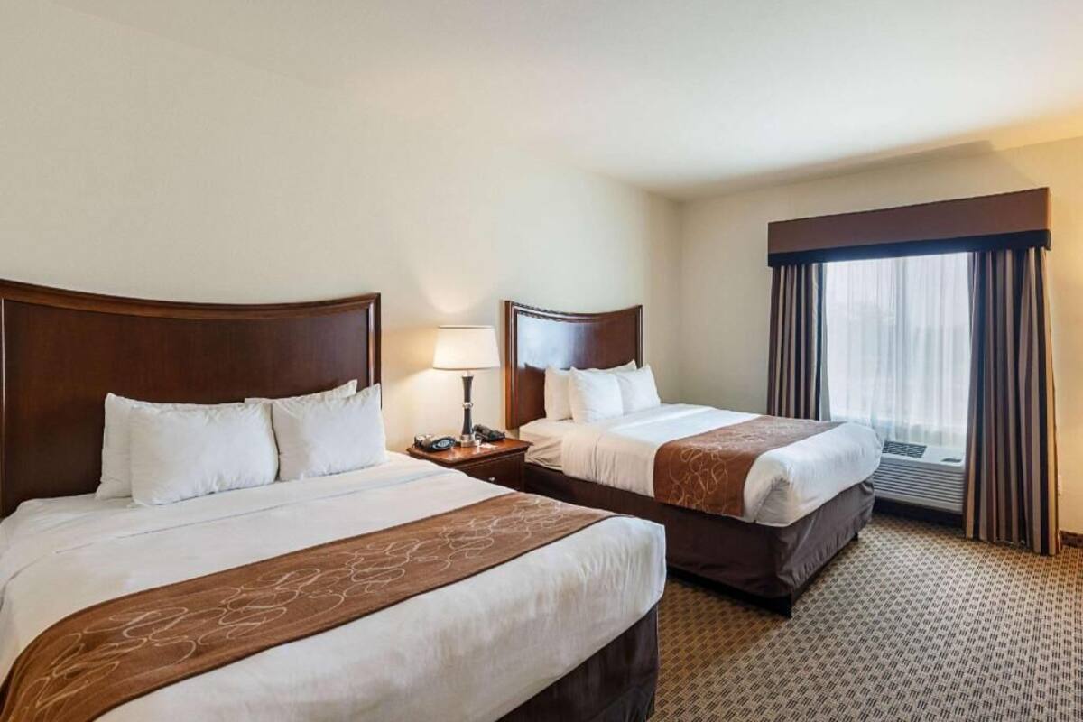 Premium bedding, pillowtop beds, desk, laptop workspace
