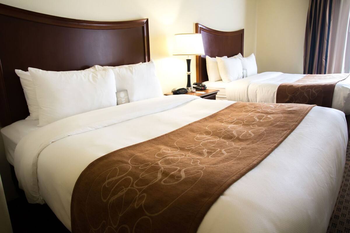 Premium bedding, pillowtop beds, desk, laptop workspace