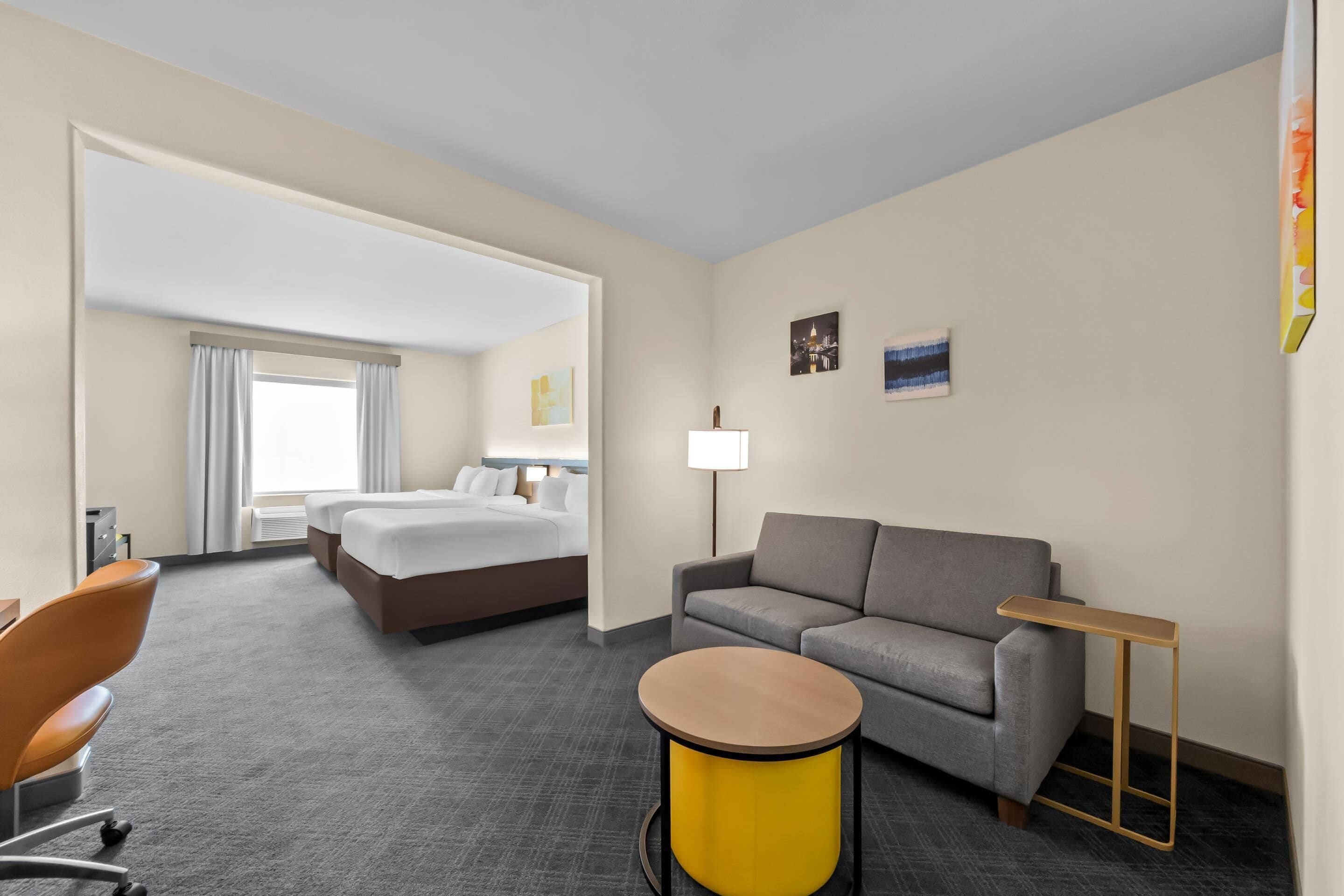 Suite, 2 Queen Beds and Sofa-bed, Non-Smoking | Premium bedding, pillow-top beds, desk, laptop workspace