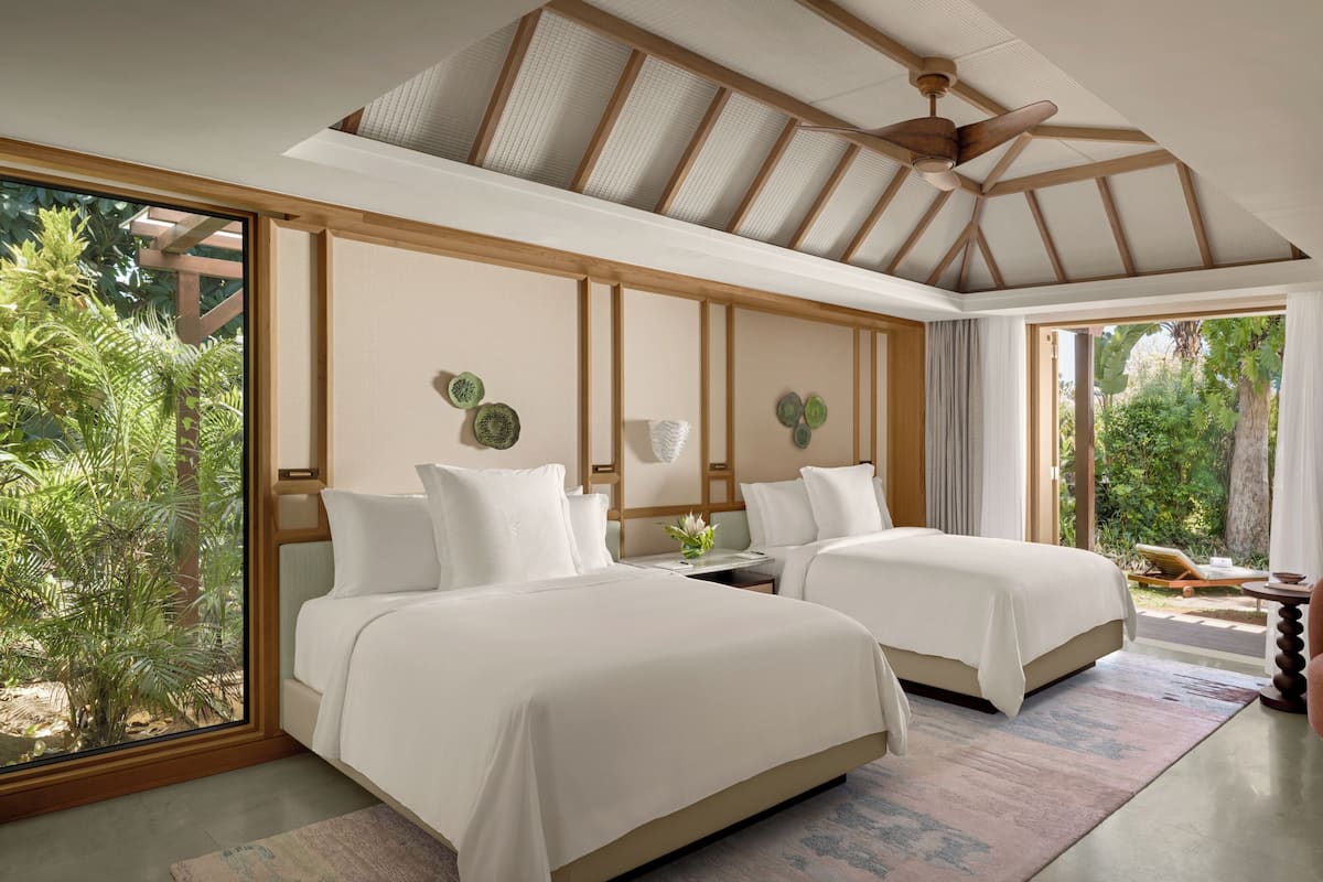 Hypo-allergenic bedding, down duvets, pillow-top beds, minibar