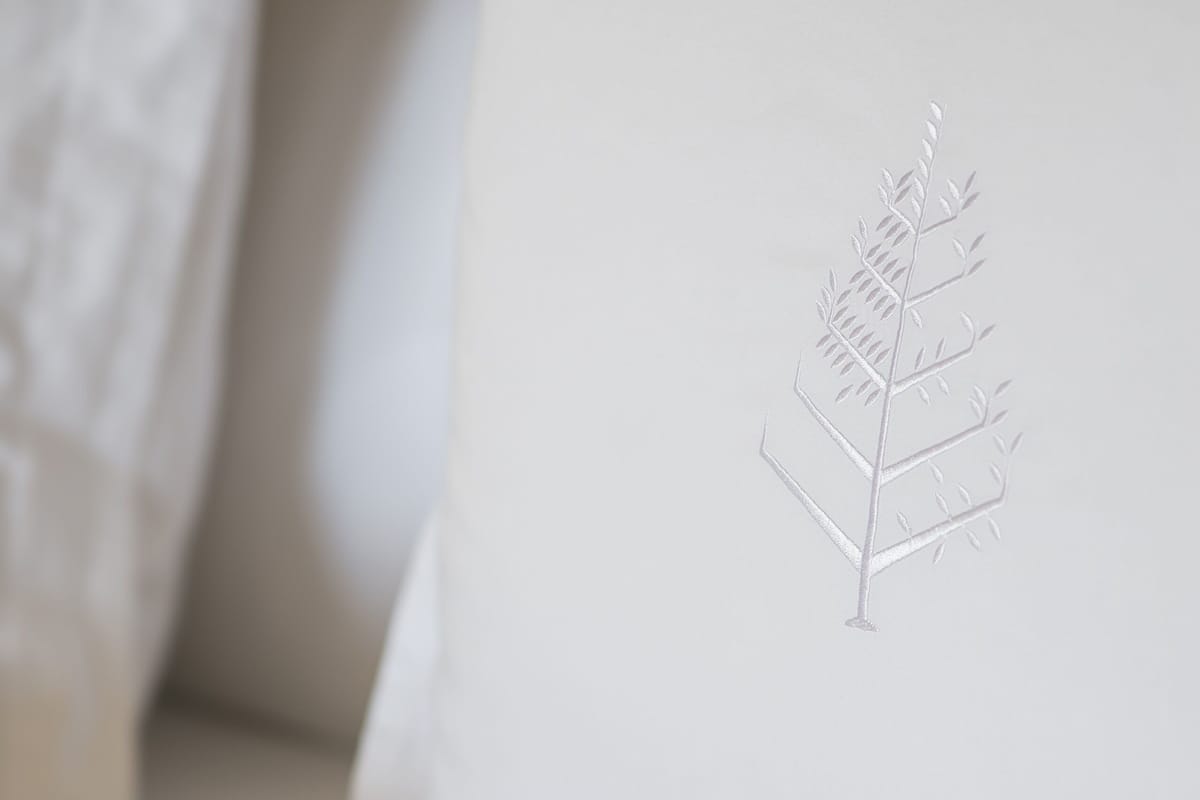 Hypo-allergenic bedding, down duvets, pillow-top beds, minibar