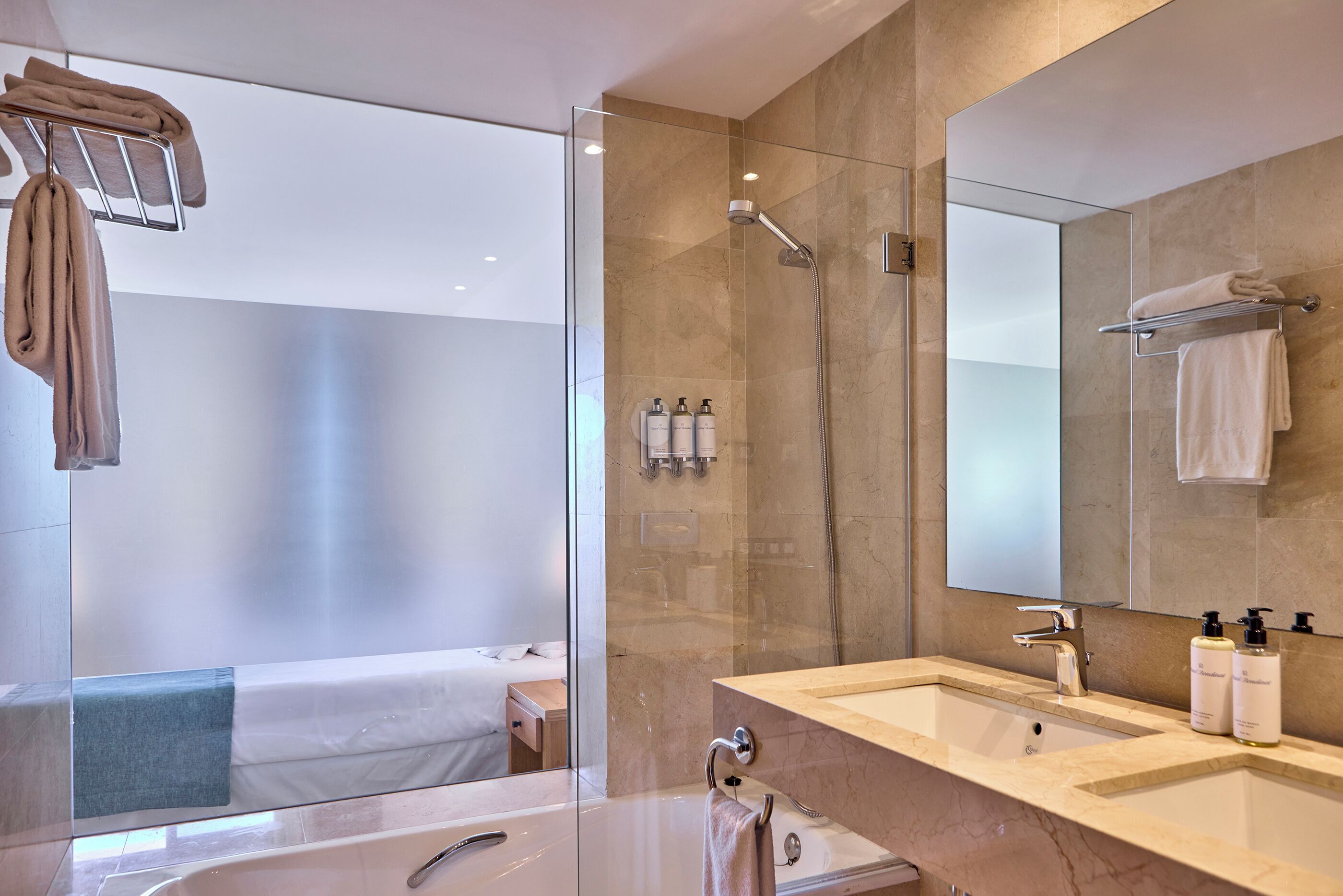 deluxe room, sea view | bathroom | eco-friendly toiletries, hair dryer, bathrobes, slippers