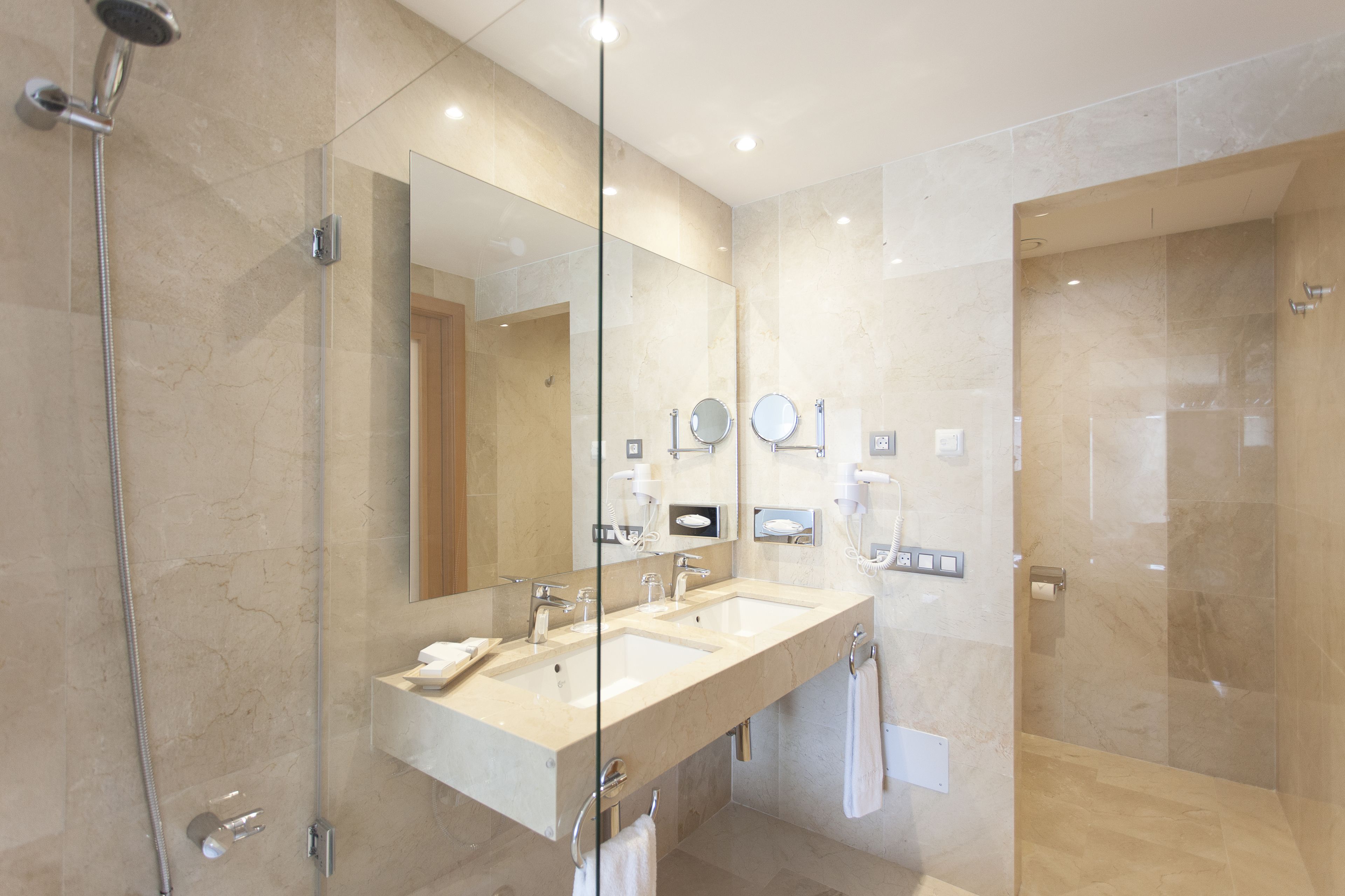 eco-friendly toiletries, hair dryer, bathrobes, slippers