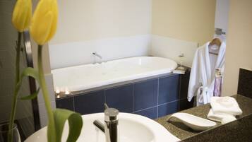 Designer toiletries, hair dryer, towels, soap