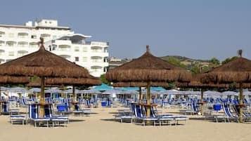 Private beach, sun loungers, beach umbrellas, beach bar