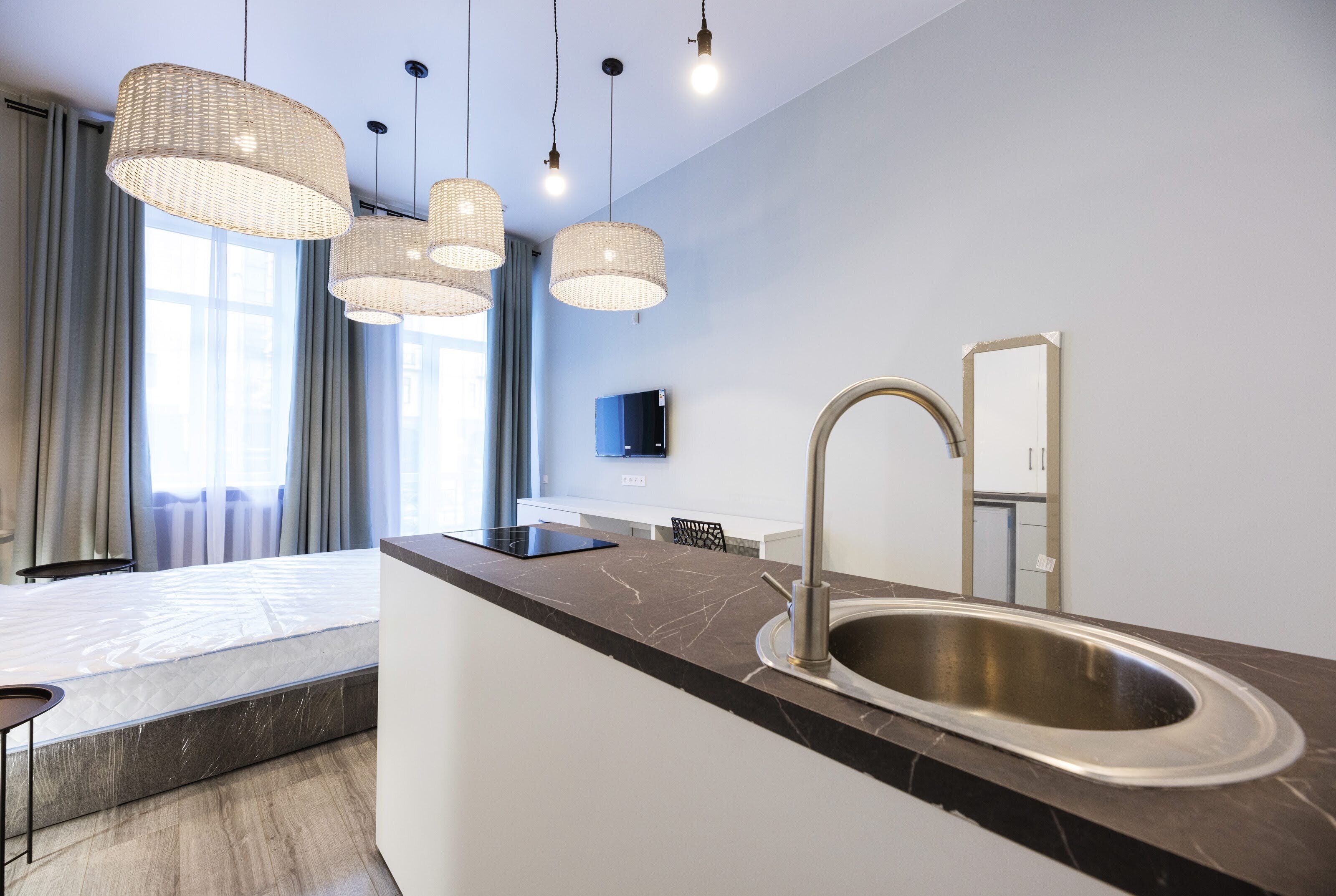 Deluxe Apartment | Private kitchen | Fridge, griddle, cookware/dishes/utensils, spices