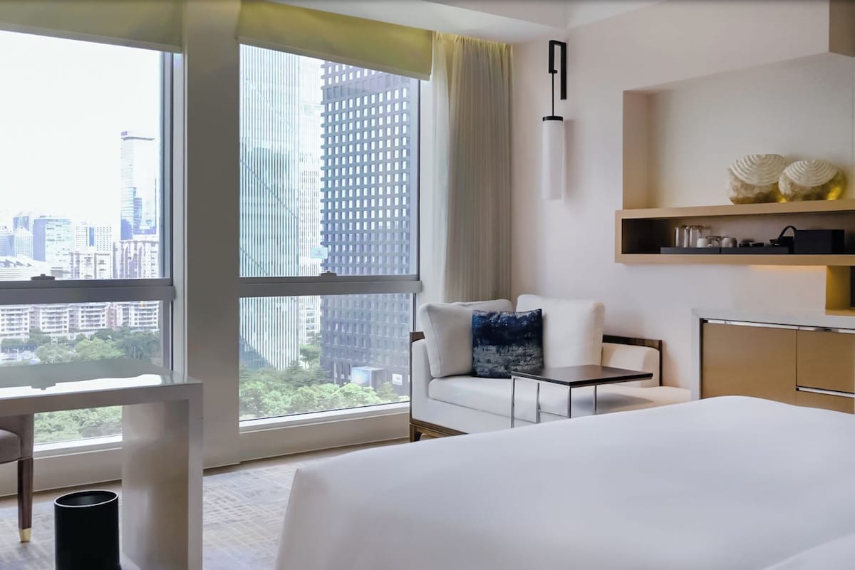 Premium bedding, down comforters, minibar, in-room safe
