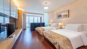 Twin Room with City View | Down comforters, in-room safe, blackout drapes, iron/ironing board