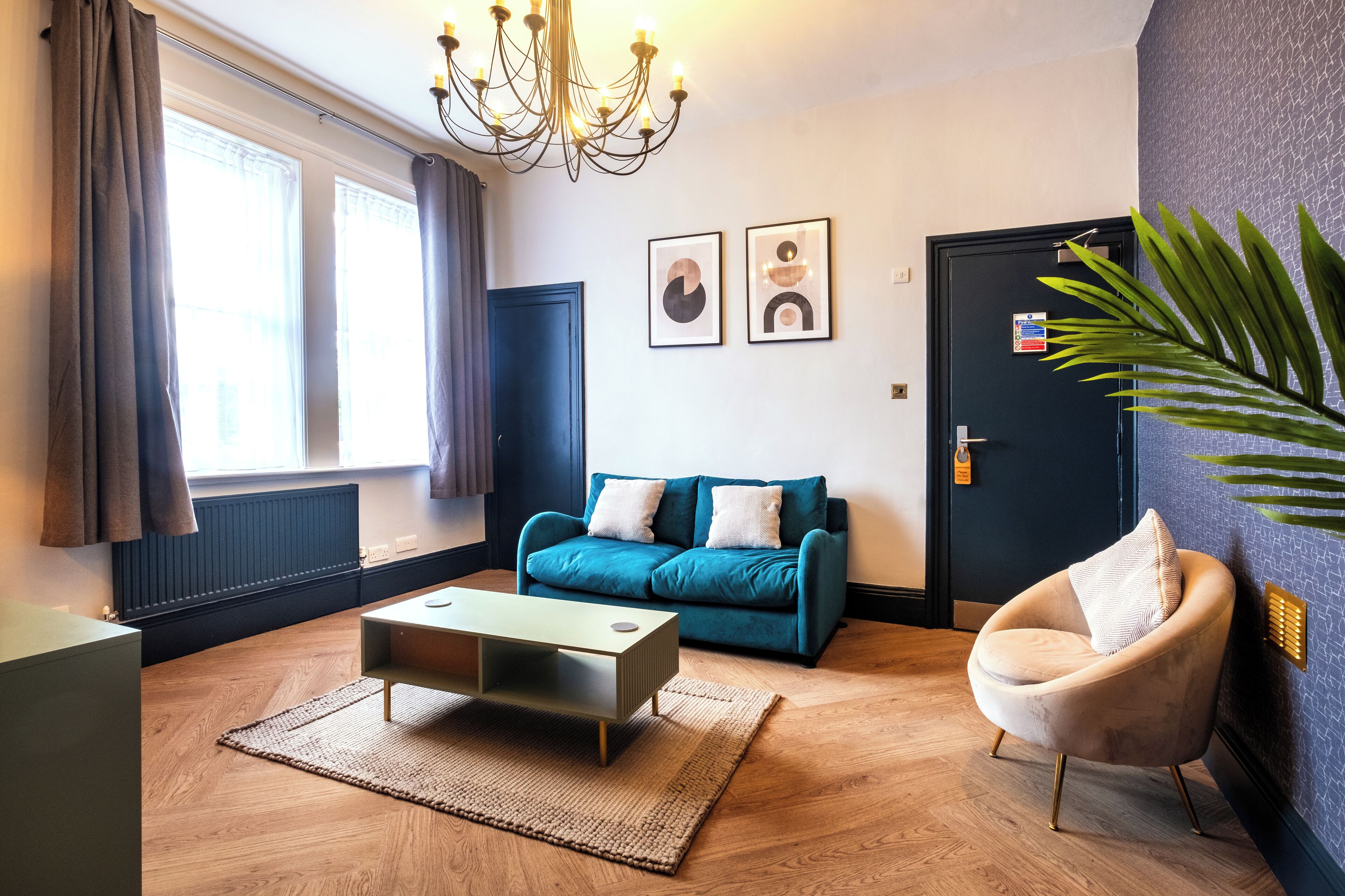 family double room | living area | flat-screen tv