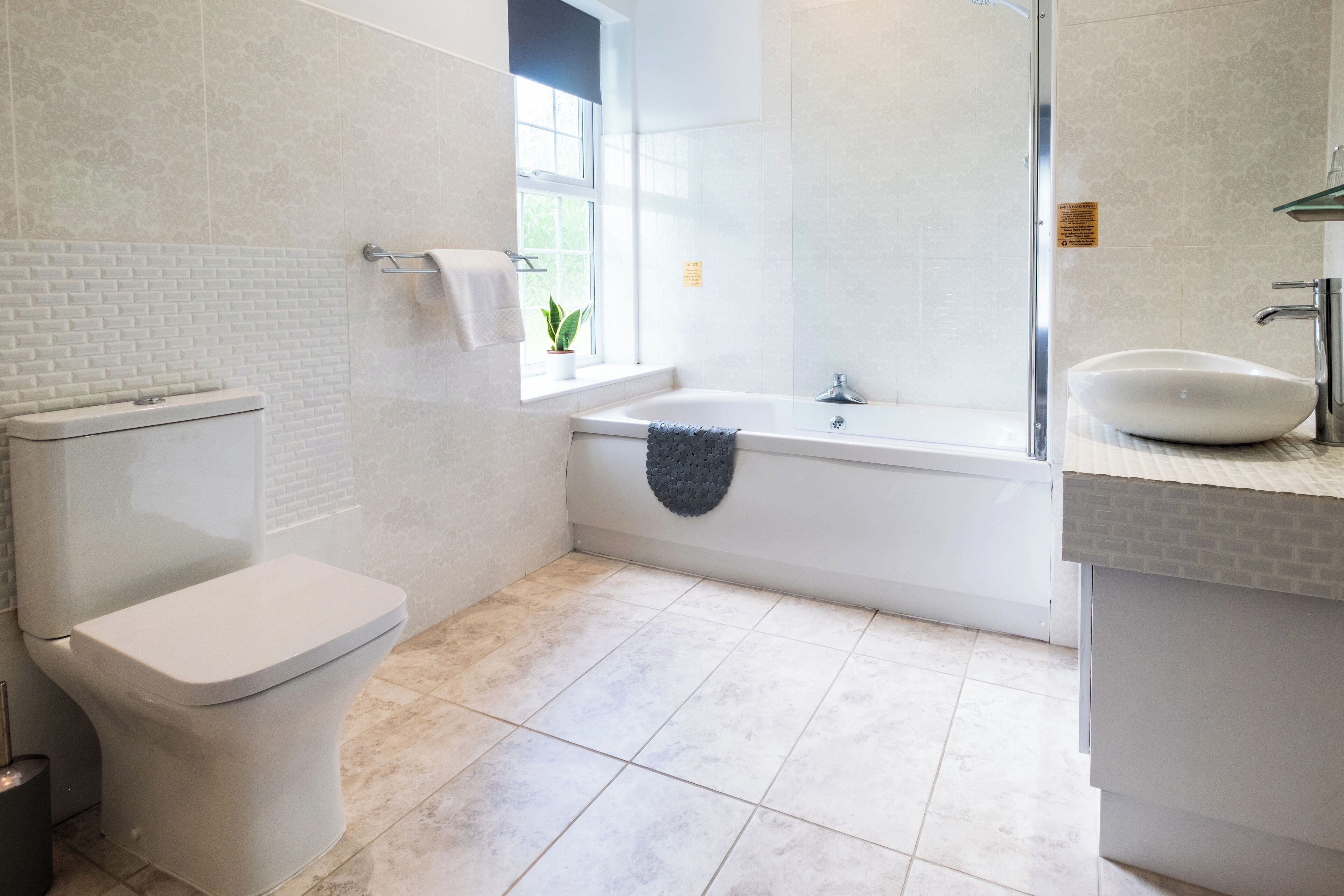 superior double room | bathroom | free toiletries, hair dryer, towels