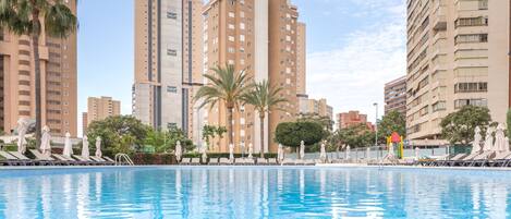 Outdoor pool, pool umbrellas, sun loungers