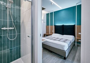Deluxe tweepersoonskamer, terras, uitzicht op tuin | Gratis wifi, beddengoed