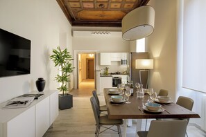 Deluxe Apartment, 2 Bedrooms, Terrace | Living area | 50-inch flat-screen TV with satellite channels, TV, iPad - Aenea Superior Inn (Rome)