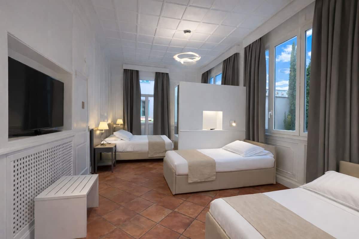 Family Room, 1 Bedroom, Terrace | Memory foam beds, in-room safe, desk, iron/ironing board (on request)