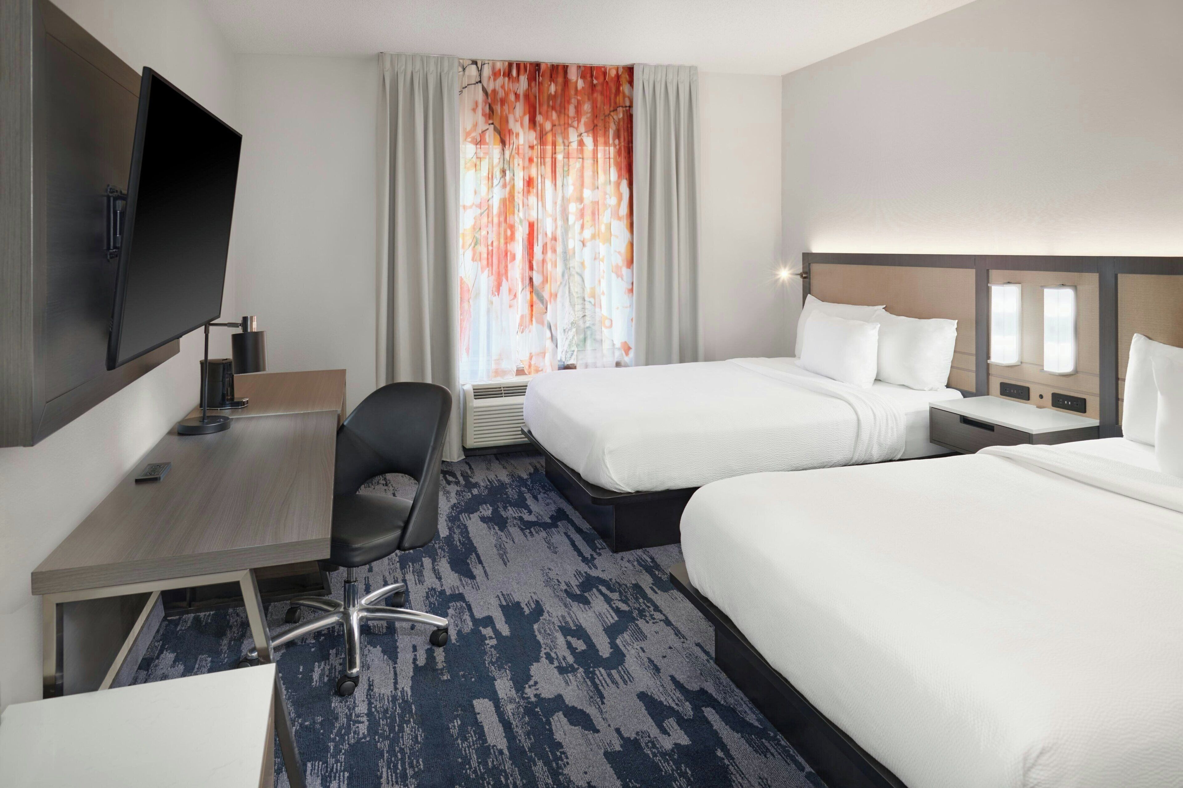 premium bedding, desk, blackout curtains, iron/ironing board