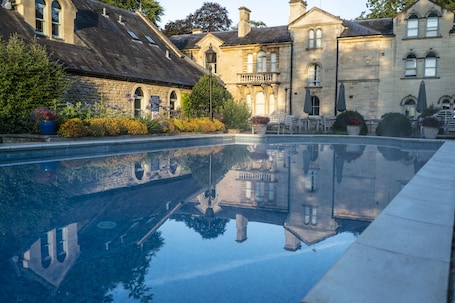Outdoor pool, open 8:00 AM to 7:00 PM, pool umbrellas, sun loungers