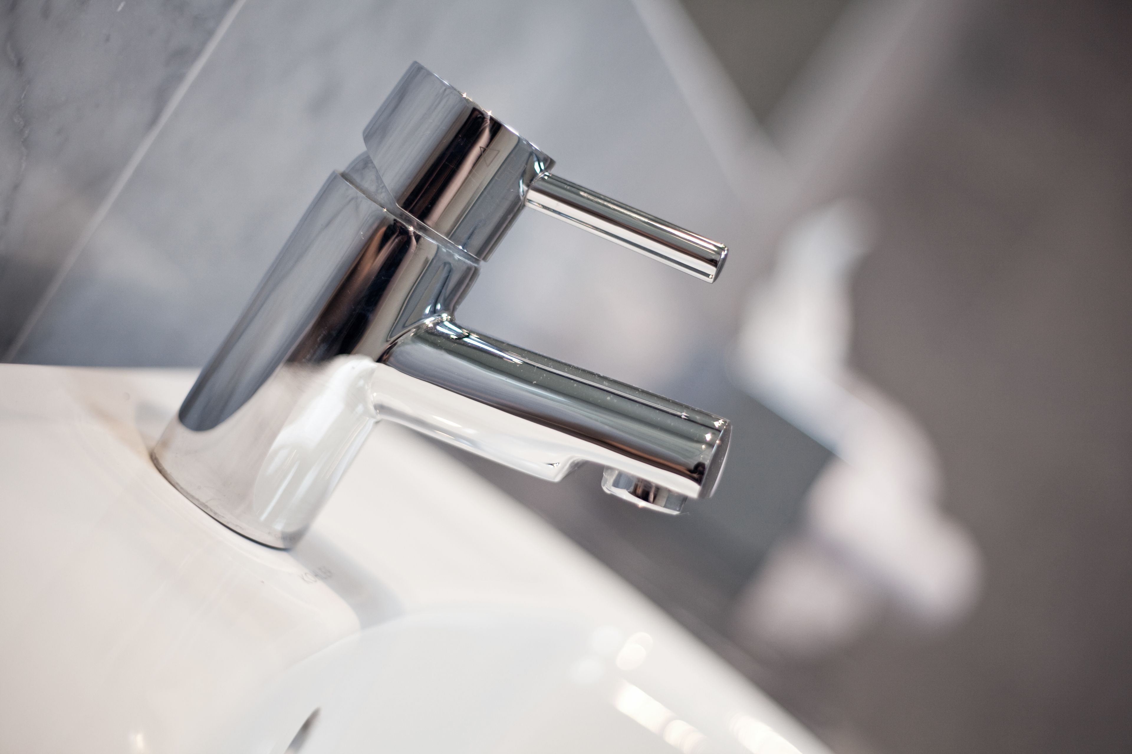 combined shower/bathtub, designer toiletries, hair dryer, bathrobes