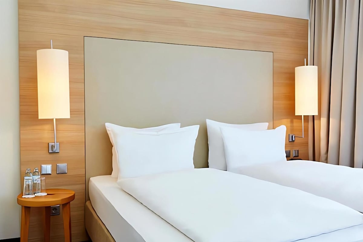 Premium bedding, desk, blackout curtains, soundproofing