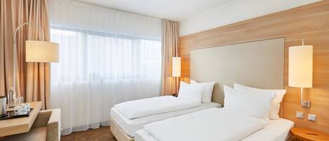 Literie de qualité supérieure, coffres-forts dans les chambres, bureau