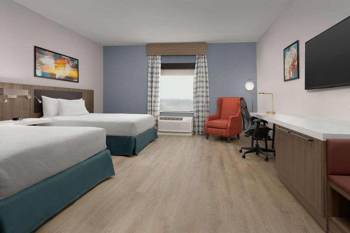 Desk, laptop workspace, cribs (free), WiFi (surcharge)