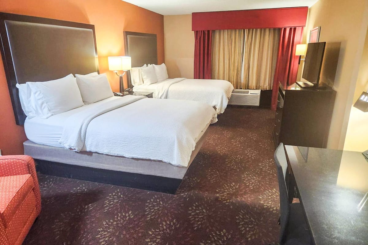 Standard Room, 2 Queen Beds, Non Smoking | In-room safe, desk, laptop workspace, blackout drapes