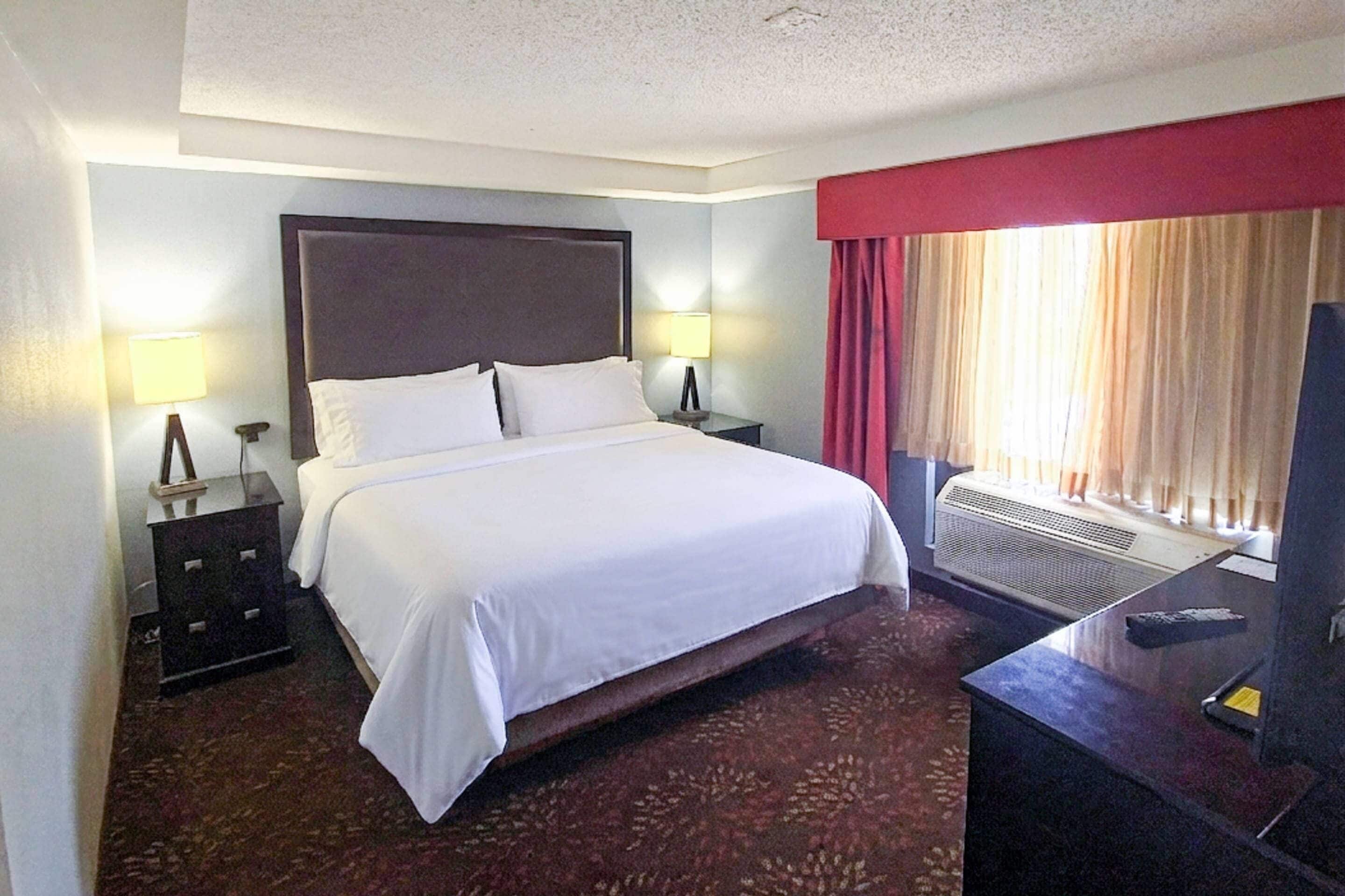 Suite, 1 King Bed, Non Smoking | In-room safe, desk, laptop workspace, blackout drapes