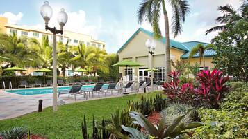 Outdoor pool, open 7:00 AM to 7:00 PM, sun loungers