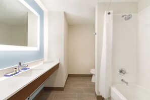 A bathroom with a white sink, mirror, and shower. - Holiday Inn Express Hotel & Suites Lavonia by IHG (Lavonia)