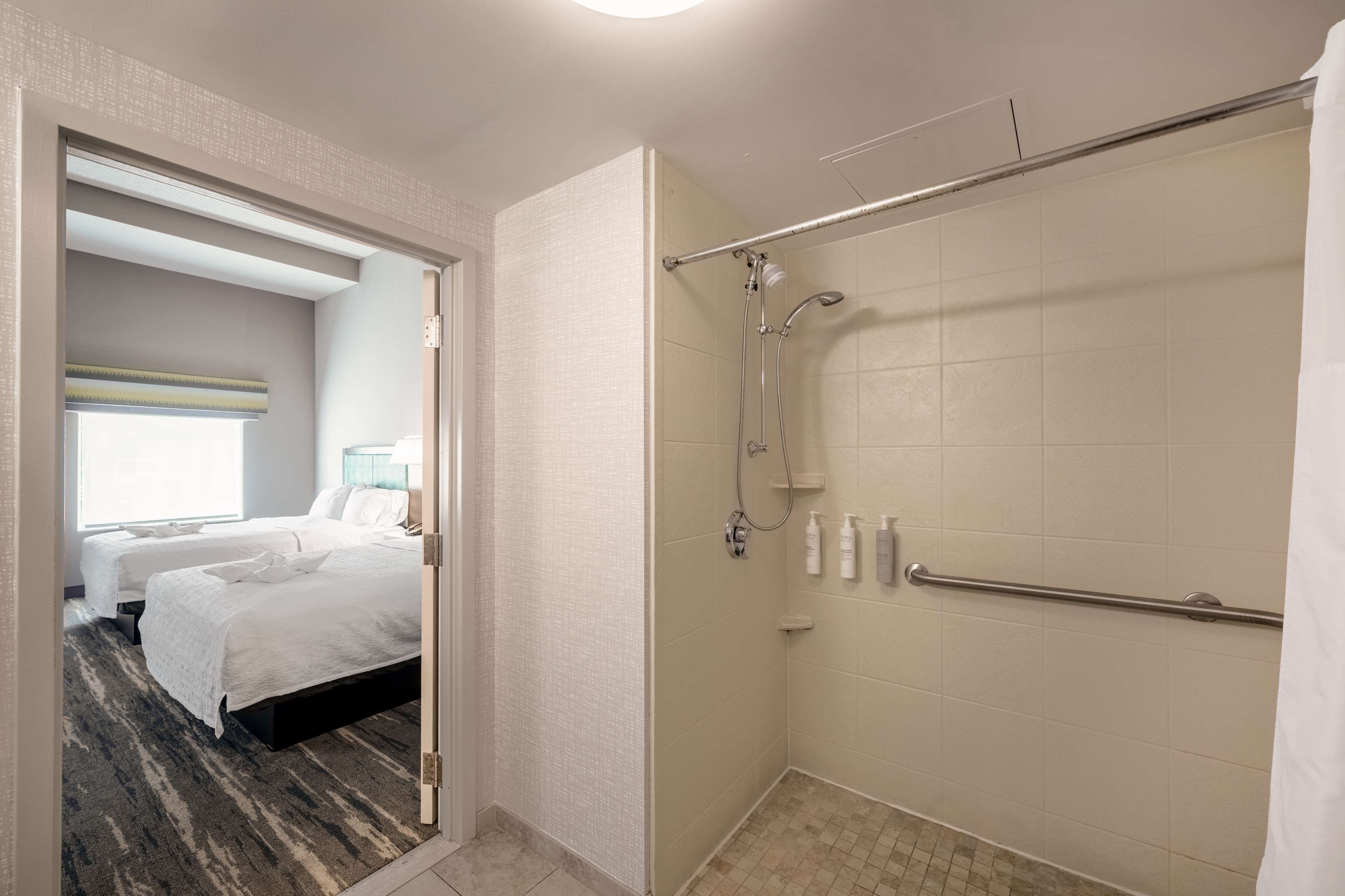 studio, 2 queen beds, accessible, non smoking | bathroom | combined shower/bathtub, free toiletries, hair dryer, towels