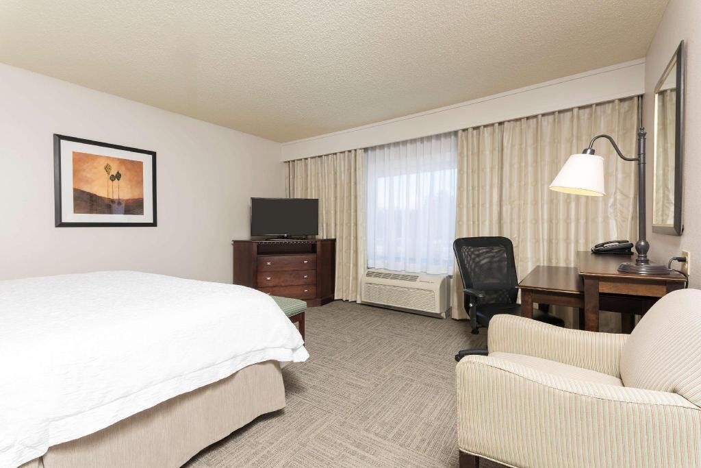 Premium bedding, laptop workspace, blackout drapes, iron/ironing board