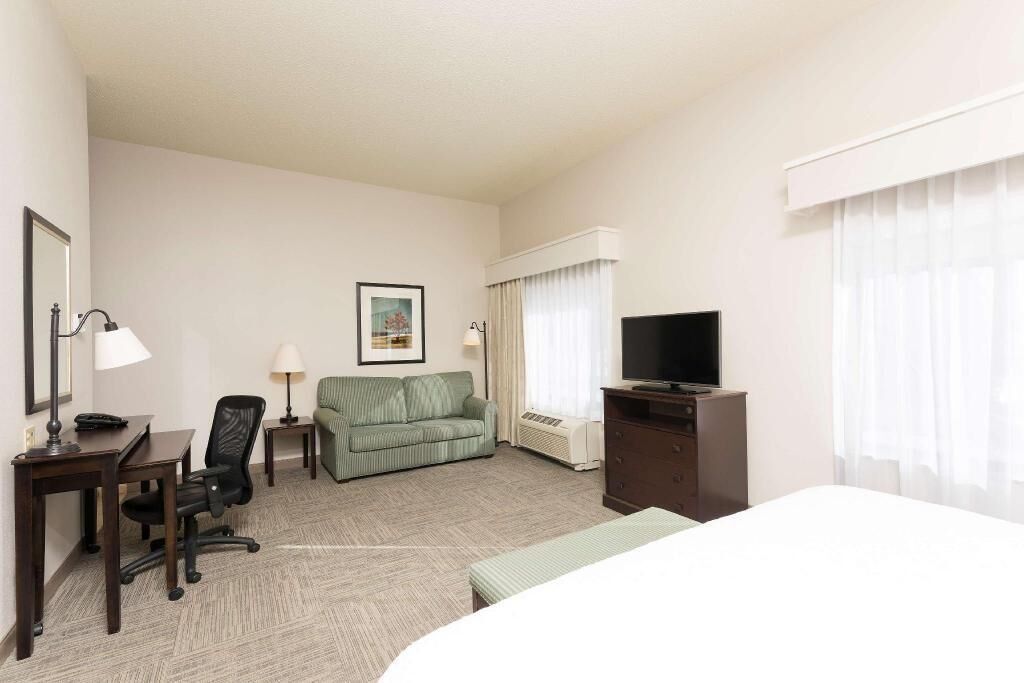 Premium bedding, laptop workspace, blackout drapes, iron/ironing board