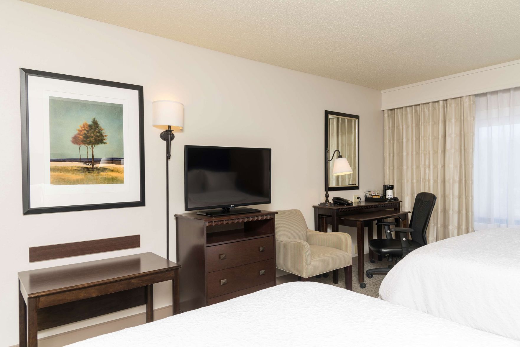 Premium bedding, laptop workspace, blackout drapes, iron/ironing board