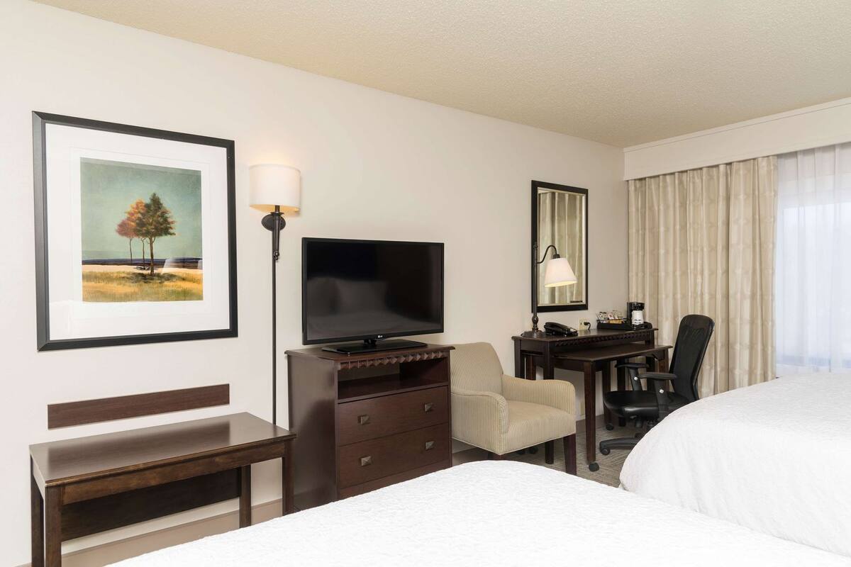 Premium bedding, laptop workspace, blackout drapes, iron/ironing board