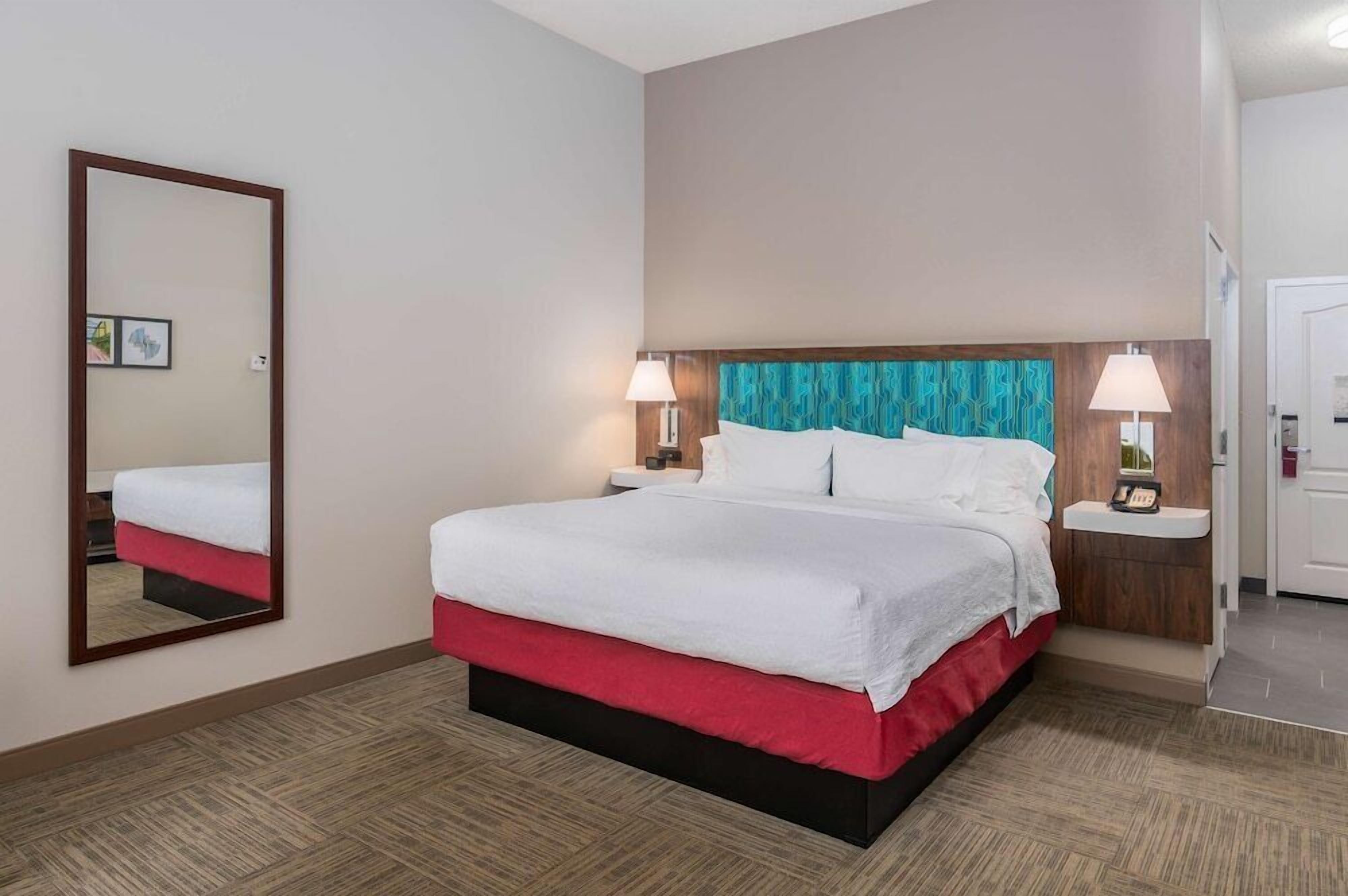 Premium bedding, laptop workspace, blackout drapes, iron/ironing board