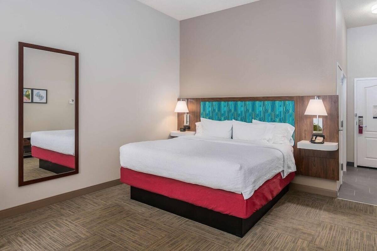 Premium bedding, laptop workspace, blackout drapes, iron/ironing board