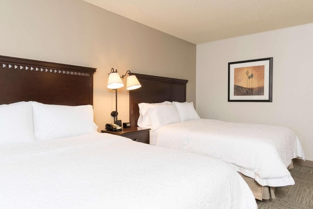 Premium bedding, laptop workspace, blackout drapes, iron/ironing board