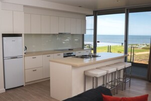 Deluxe One Bedroom Apartment - Ocean View | Private kitchen | Coffee/tea maker, freezer