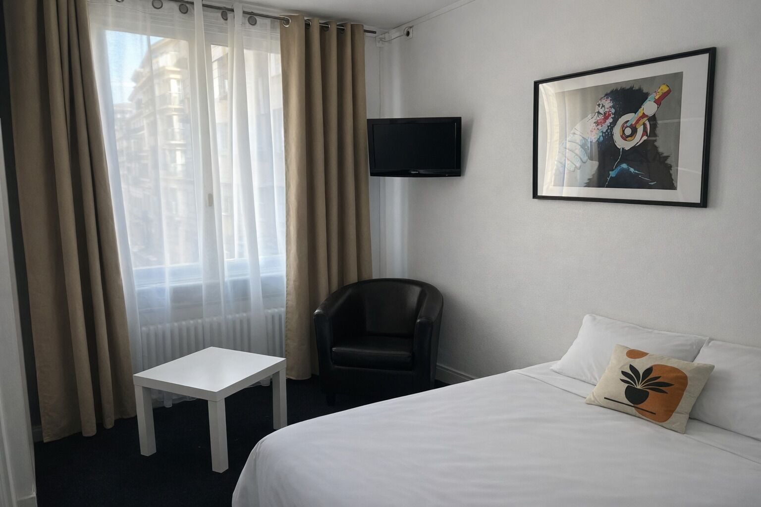 City eenpersoonskamer | Verduisterende gordijnen, een strijkplank/strijkijzer, gratis wifi