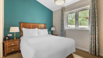 Coffres-forts dans les chambres, fer et planche Ă repasser