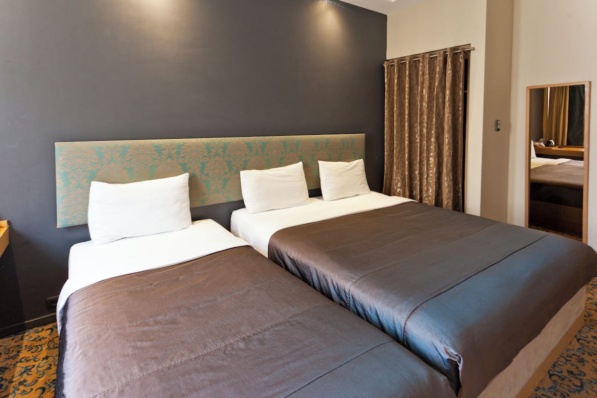 1 habitación, ropa de cama de alta calidad y minibar