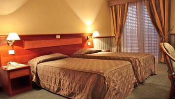 Desk, iron/ironing board, free cribs/infant beds, rollaway beds