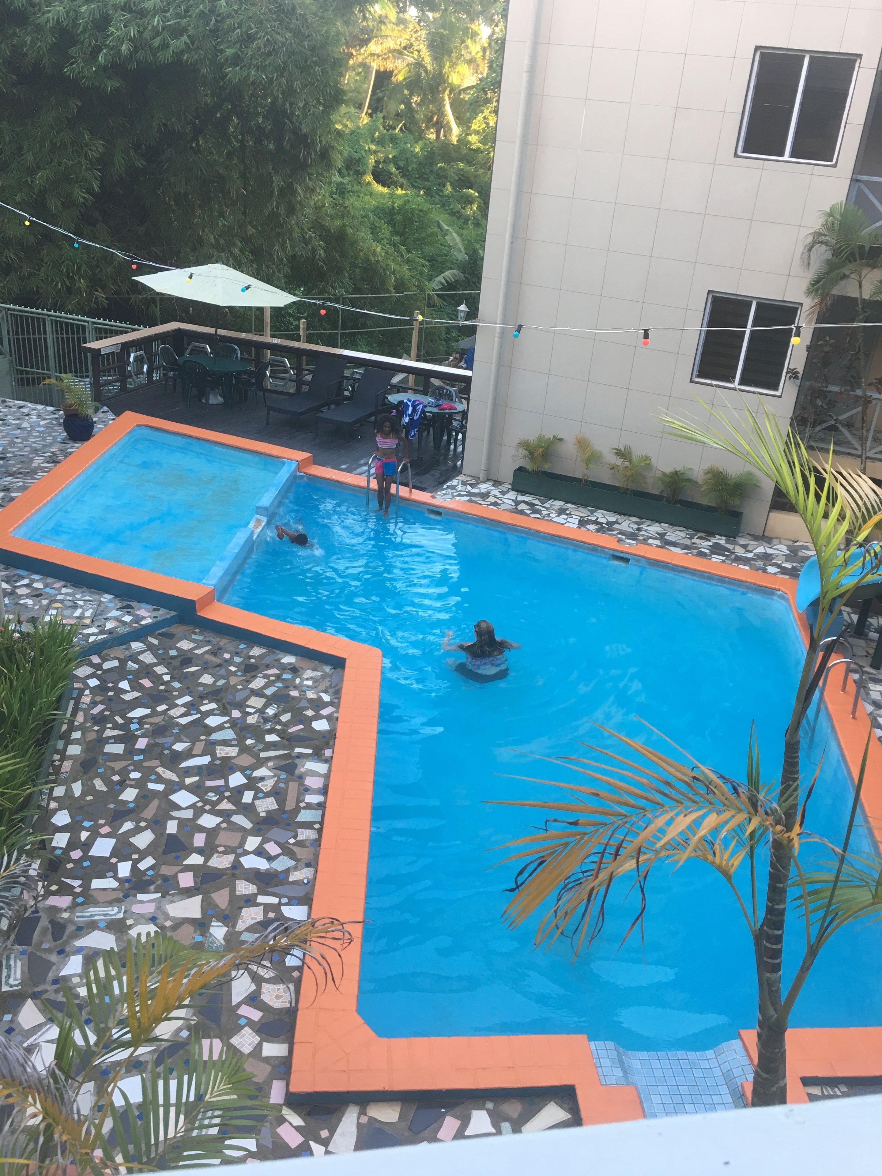 Outdoor pool, open 7:00 AM to 7:00 PM, pool umbrellas, sun loungers