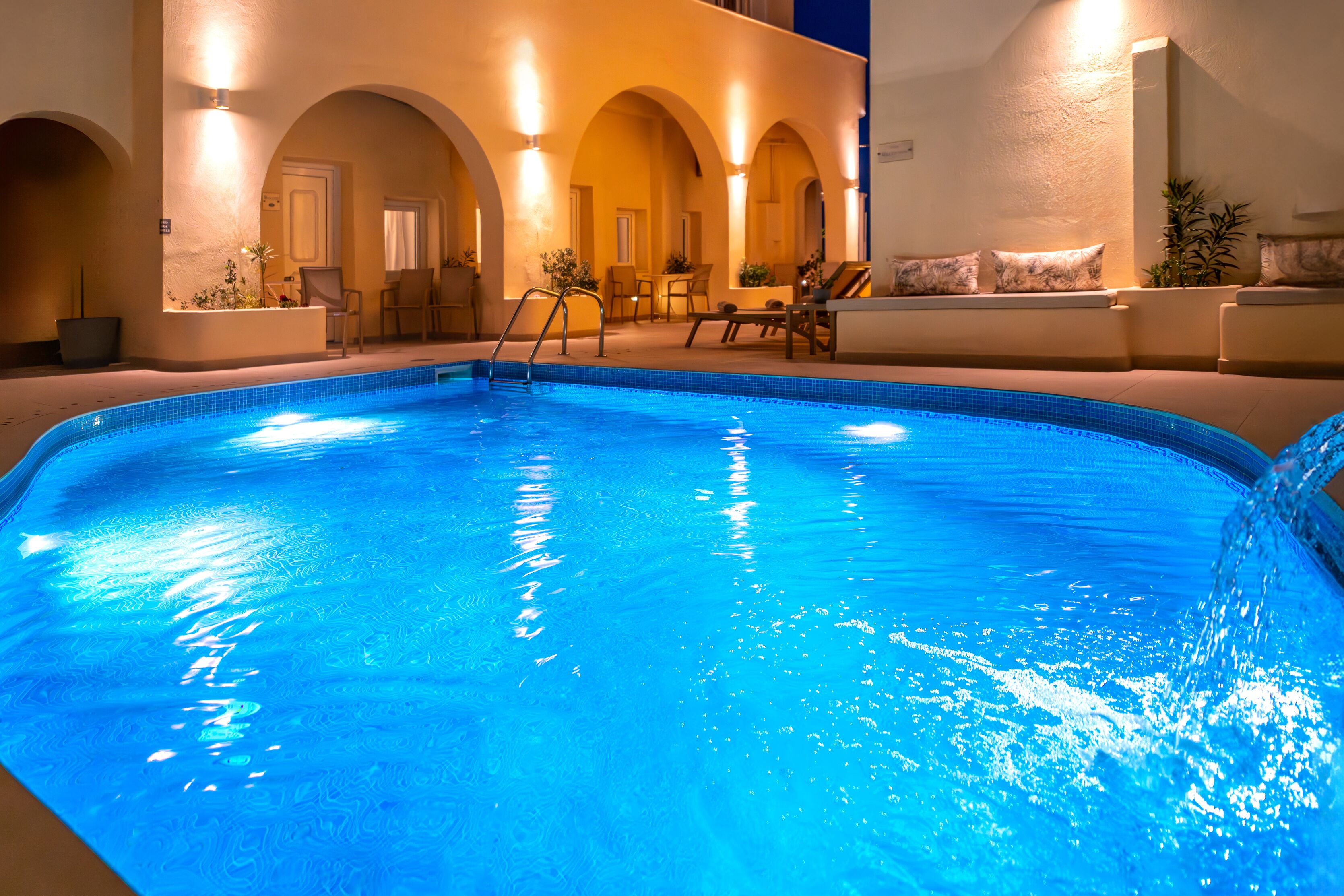 seasonal outdoor pool, open 10:00 am to 7:00 pm, pool umbrellas