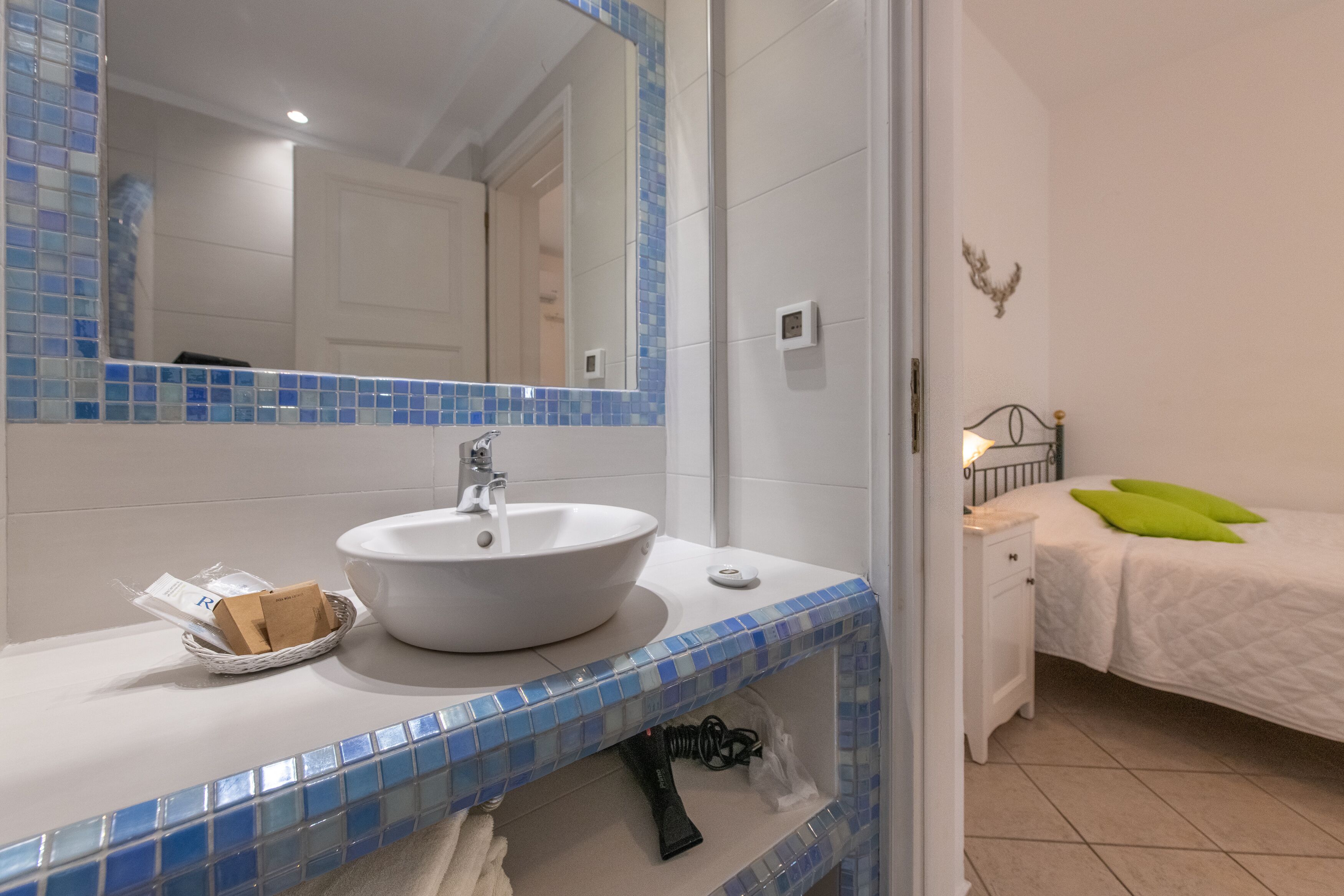 standard room | bathroom | shower, free toiletries, hair dryer, slippers